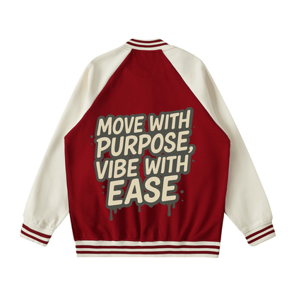 Back view of two tone raglan sleeve varsity jacket in red and white with "Move with purpose, vibe with ease" text design on the back