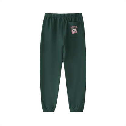 Funkdafied heavyweight cotton sweatpants in dark green with back pocket and logo patch, casual streetwear joggers.