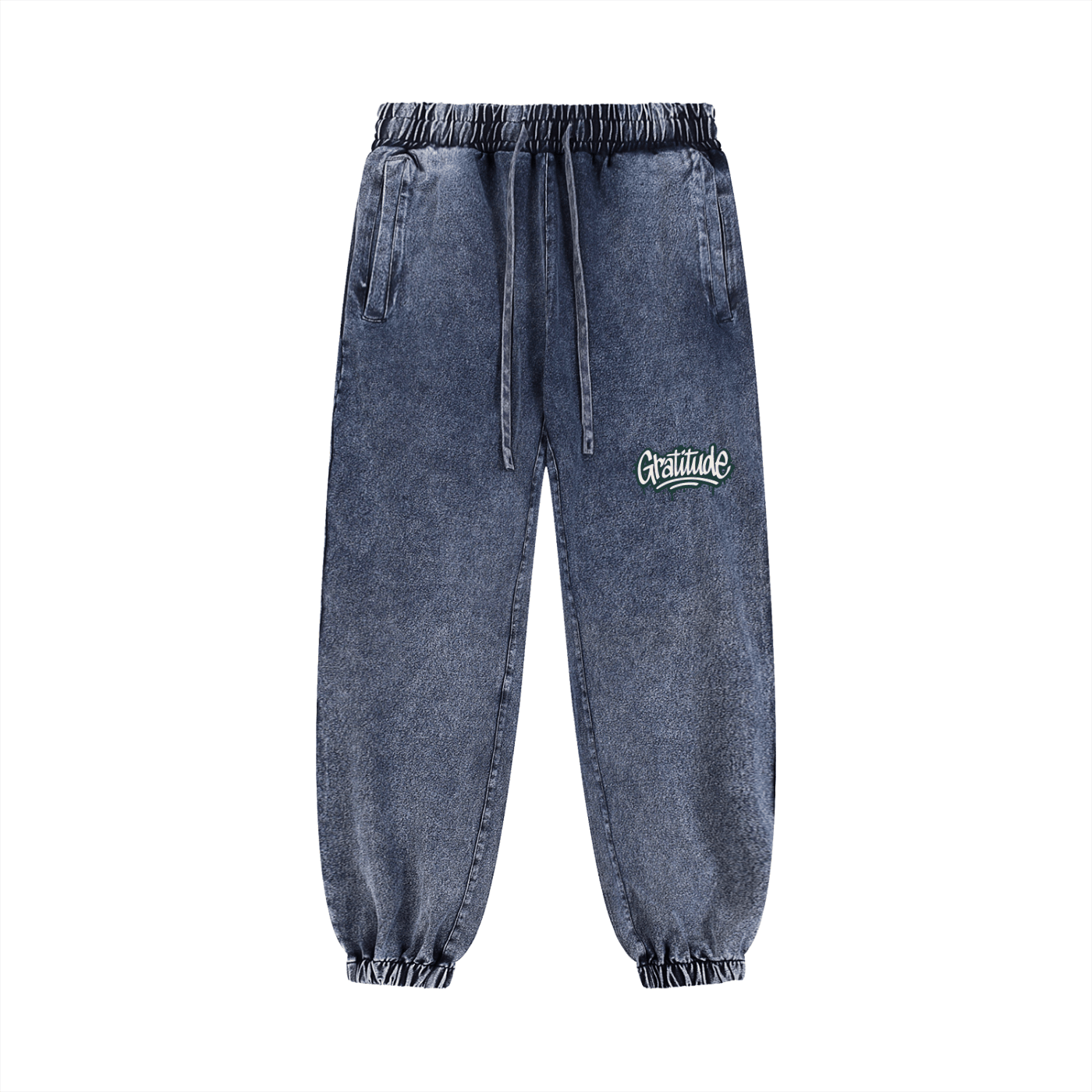 Unisex snow wash jogged sweatpants with elastic waist, drawstring, pockets, and "Gratitude" logo, made of cotton-spandex blend.