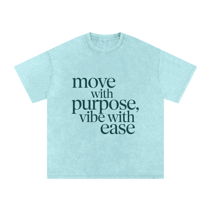 Light blue snow washed oversized cotton t-shirt with "move with purpose, vibe with ease" text print, soft breathable everyday tee
