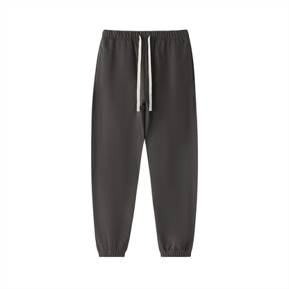 Black heavyweight cotton sweatpants with drawstring waistband and elastic cuffs.