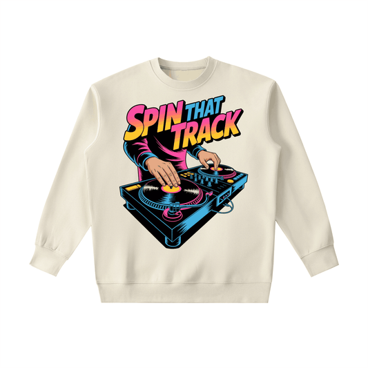 Heavyweight Crewneck Sweatshirt with colorful "Spin That Track" DJ turntable graphic on cream cotton blend fabric.