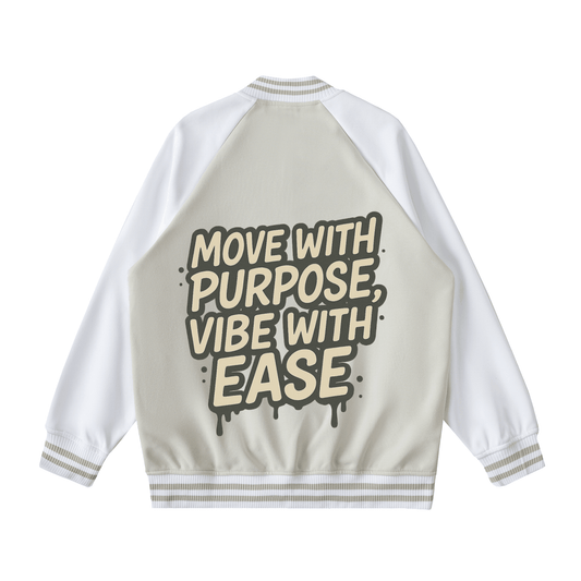 Two tone raglan sleeve varsity jacket with graphic text "Move with purpose, vibe with ease" on back